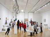 Visitors enjoy the 2021 Waste into Art exhibition. Picture supplied.