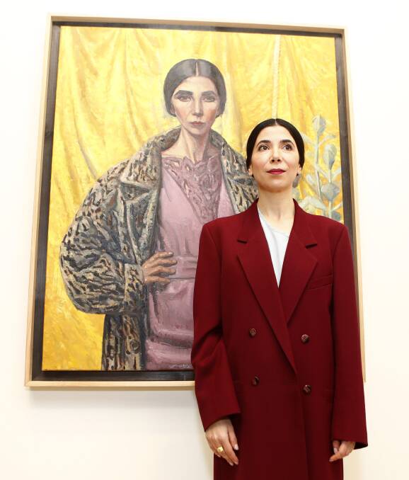 REGIONAL WIN: Yvette Coppersmith with her 2018 Archibald Prize winning self-portrait, which is on display in Tamworth. Photo: Daniel Munoz