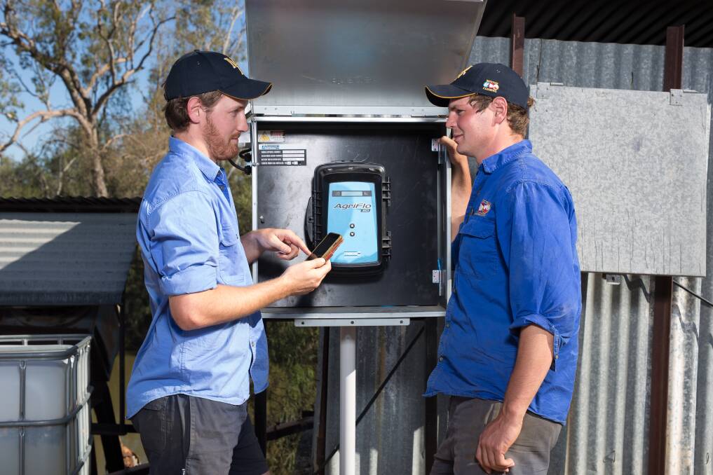 Technological advances: Daniel and Sam Kahl checking on one of the new Mace water meters that allow them to check in remotely using their phone or computer. 