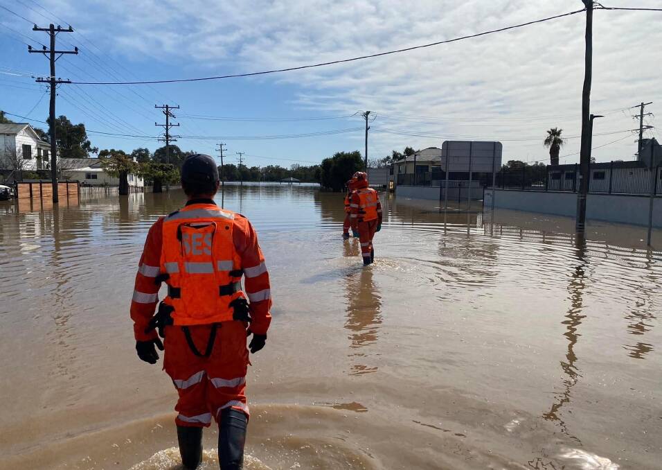 Traffic was thrown into chaos while roads, paddocks and sporting fields went underwater after flooding rains. Pictures by Gareth Gardner and Peter Hardin