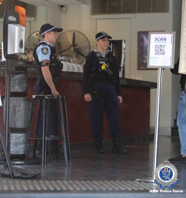 On patrol: NSW Police and SafeWork NSW Inspectors spent the weekend checking pubs and clubs, and carrying out self-isolation compliance checks. Photo: NSW Police