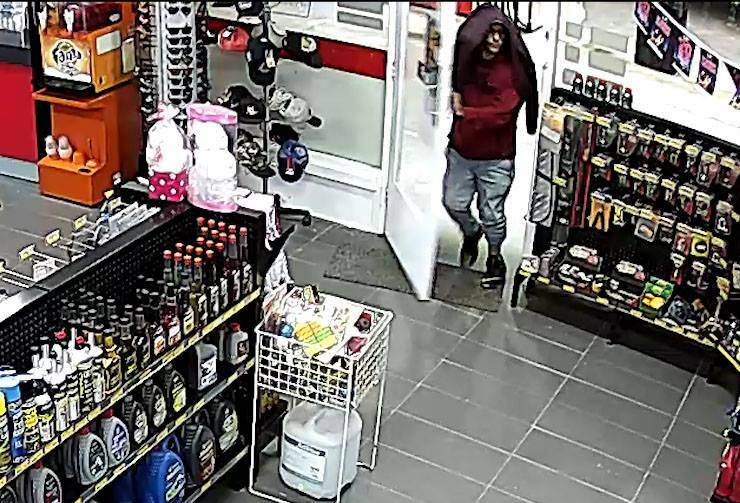 Guilty plea: CCTV footage of Bo Matthews as he robbed the Caltex service station in Werris Creek on March 23, 2019, with a large knife. Photo: Oxley Police