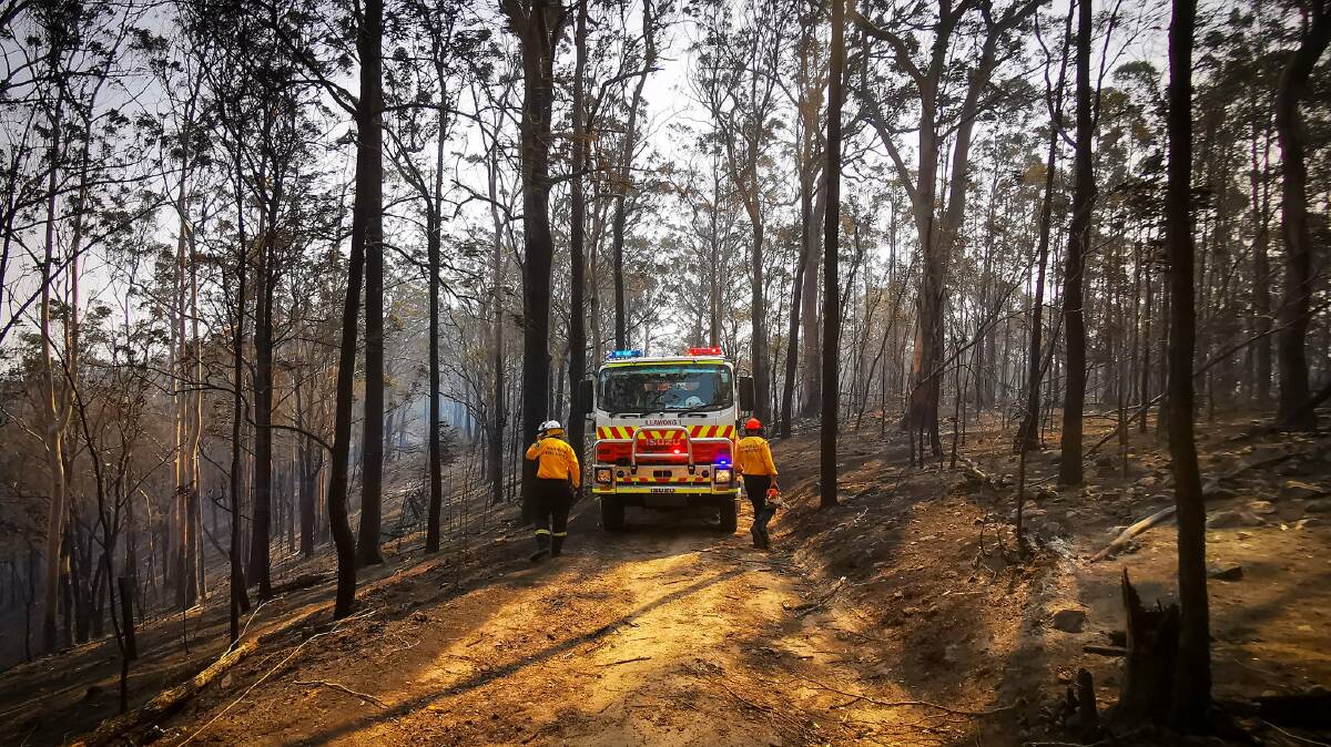 Total fire ban: Firefighters at the Long Gully Rd Fire, which has been contained. Photo: NSW RFS