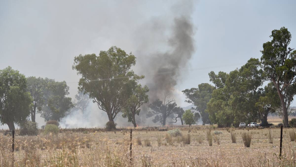 Severe conditions: RFS crews extinguished this blaze at Carroll on Saturday. Photo: Ben Jaffrey