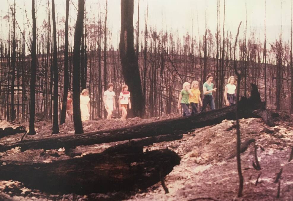 Kylie Miller, in yellow, with friends from Tanja Public School after the 1980 fire.
