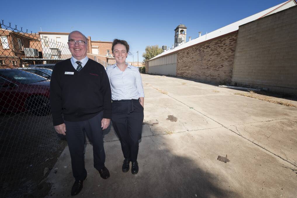 Gunnedah Shire Council's tourism supervisor Chris Frend and cultural precinct team leader Lauren Mackley standing on council's new block of land, which will be incorporated into the precinct. Photo: Peter Hardin