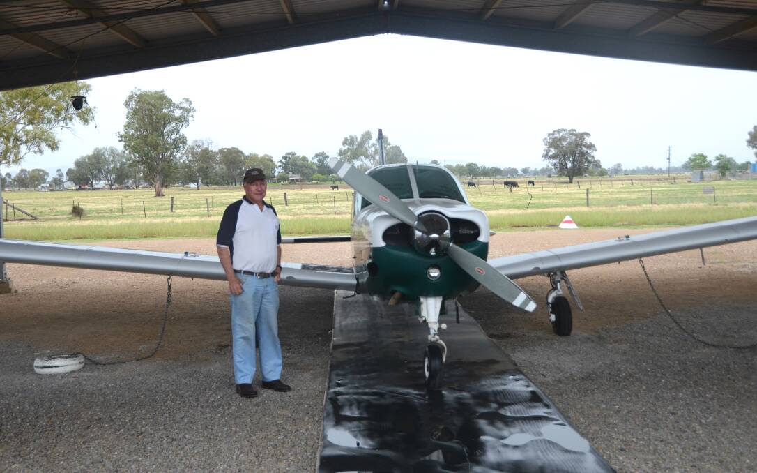 PASSION FOR FLYING: Mike Barnier with his plane at the Gunnedah Airport. He has used this same plane in all 73 of his missions with Angel Flight since 2003.
