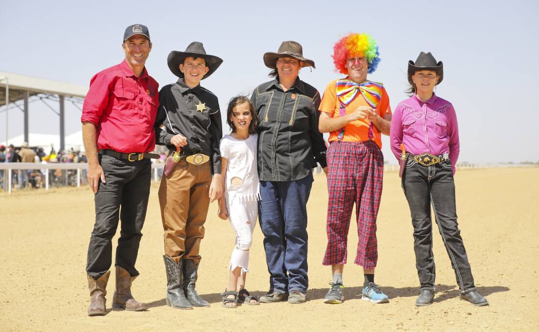 Adventure time: Mick, Max, Sienna, Erin, Brandon and Georgie Edmunds at a fashions on the field event at the Birdsville Races. Photos: Salty Dingo