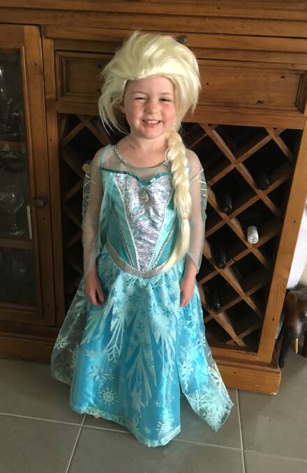 Adelaide wearing her beloved Elsa wig and dress.