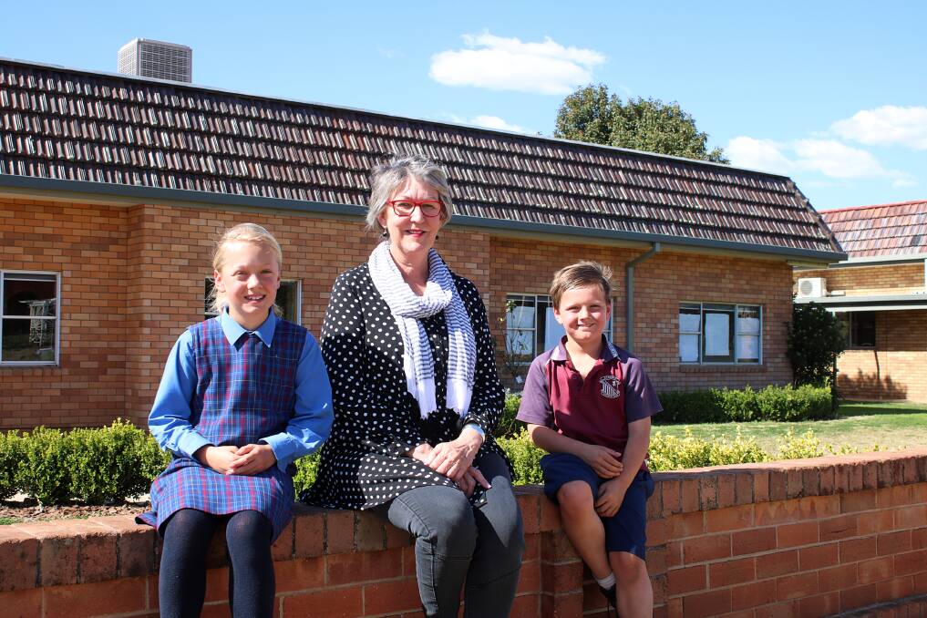 St Xavier's Primary School students Amber and Angus Linfield will learn in the new classrooms. They are pictured with principal Jen Honner.