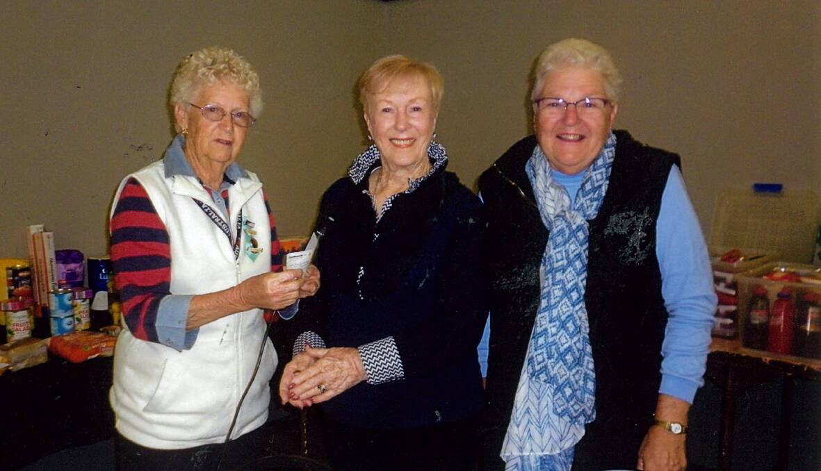 BEQUEST: Gunnedah Pensioners and Superannuants Association Myra Tailby, left, and Helen Cruickshank, right, present a cheque of more than $10,000 to Yallambee's Margaret Dodd. Photo: supplied