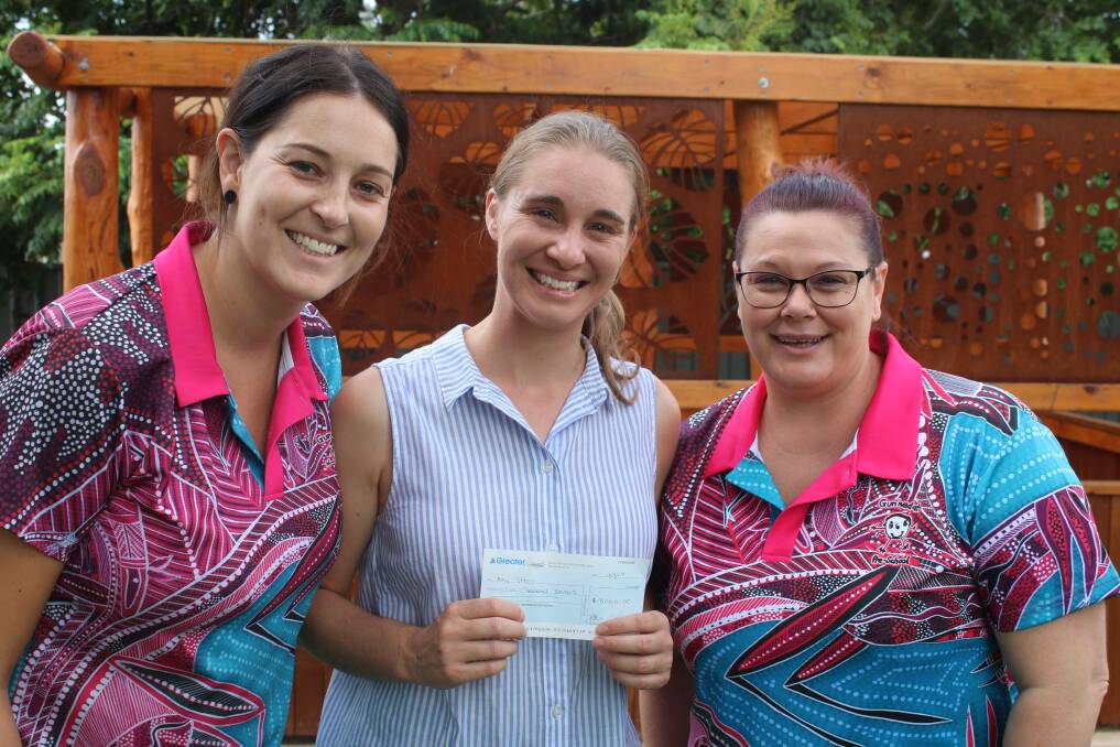 Lucy's mum Amy Elton (centre) with Gunnedah Preschool's Kate Olsen and Tabatha Smith on Monday.