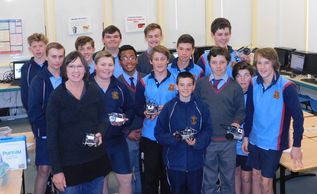 Suzanne Feodoroff conducting a robotics workshop with year 8 students last year. Photo: supplied