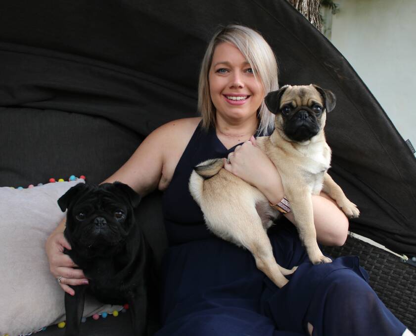 Katie Johnson at home with her "fur babies", Wynston and Walter. Photo: Vanessa Höhnke