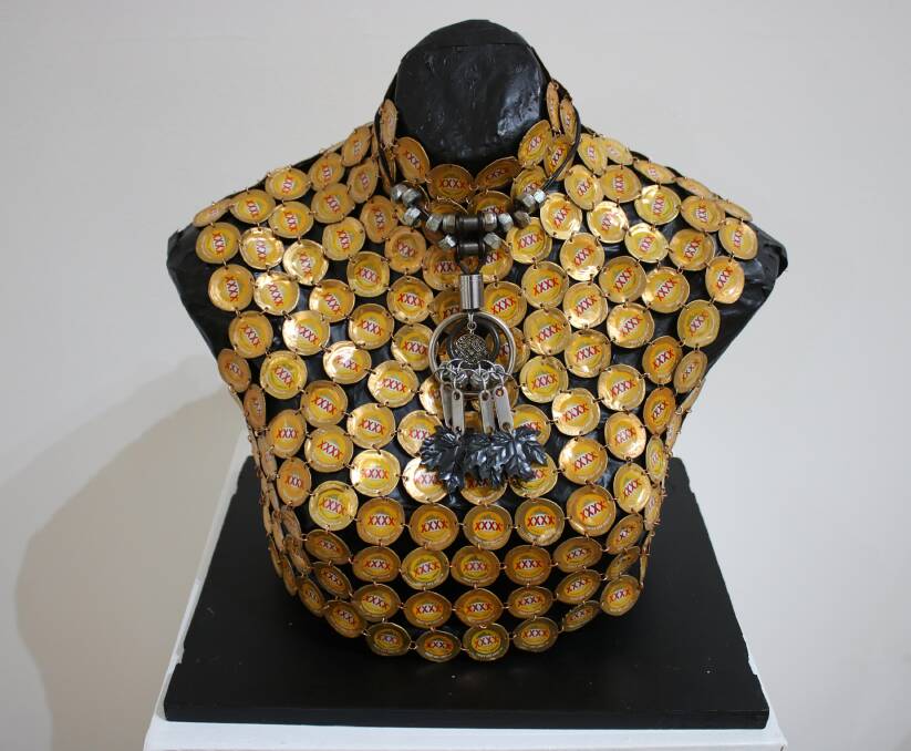 XXXX Gold stubby lids inspired Liz Emmerson to create this metallic bust in 2017 titled Junkware Lady.