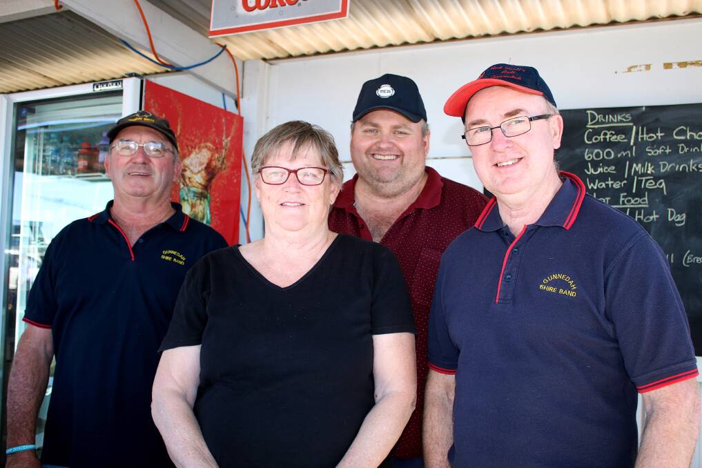 Graham and Lorraine Riley, Paul Herden and Laurence Rowe keep up with orders at the Gunnedah Shire Band stand at AgQuip on Tuesday.