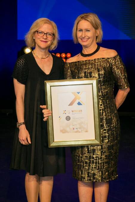ACCOLADES: Lively Linseed's Jacqui Donoghue, right, receives the NSW Export Scholarship Award at the 2017 Premier’s NSW Export Awards. She is pictured with Alex Paterson of Fragomen. Photo: Supplied