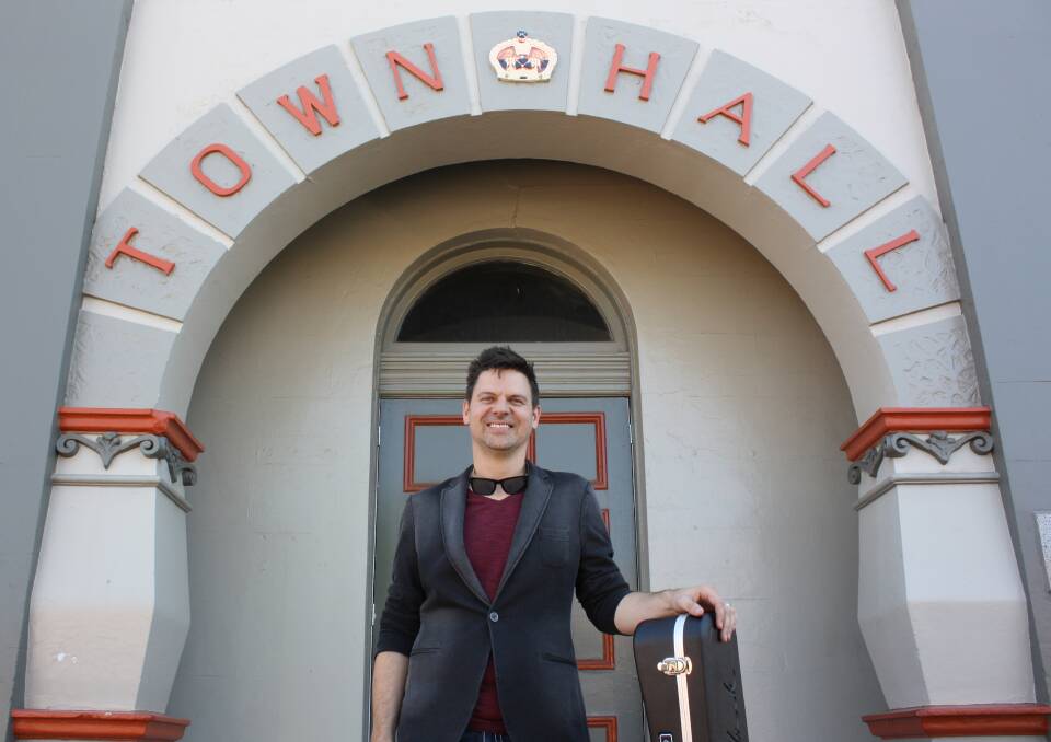 Former Gunnedah musician Anthony Snape outside the Gunnedah Town Hall where Remembrance Day production will take place.