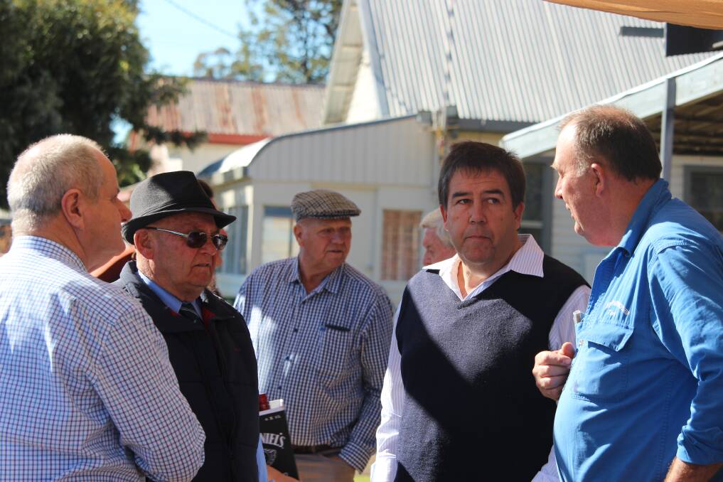 Liverpool Plains Shire Council's general manager Ron van Katwyk, deputy mayor Doug Hawkins, councillors Paul Moules and Ian Lobsey, and engineering services director Warren Faulkner with Spring Ridge resident Tom Archer.