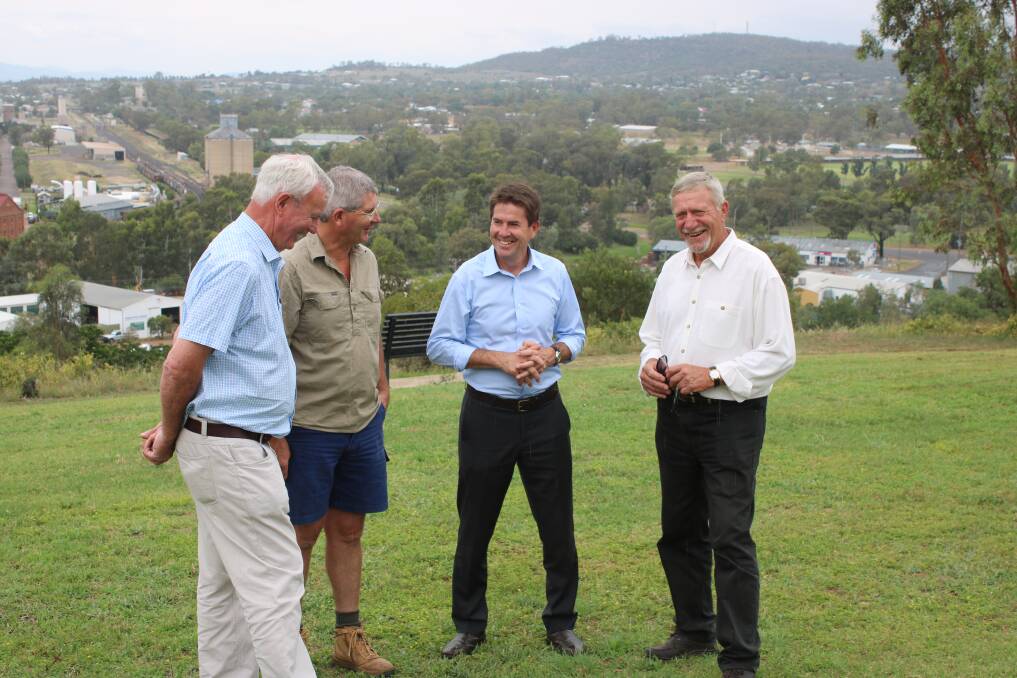 Tamworth MP Kevin Anderson with Gunnedah Urban Landcare Group members Malcolm Heath, George Truman and Owen Hasler at Pensioners Hill on Wednesday. GULG helps maintain the lookout.