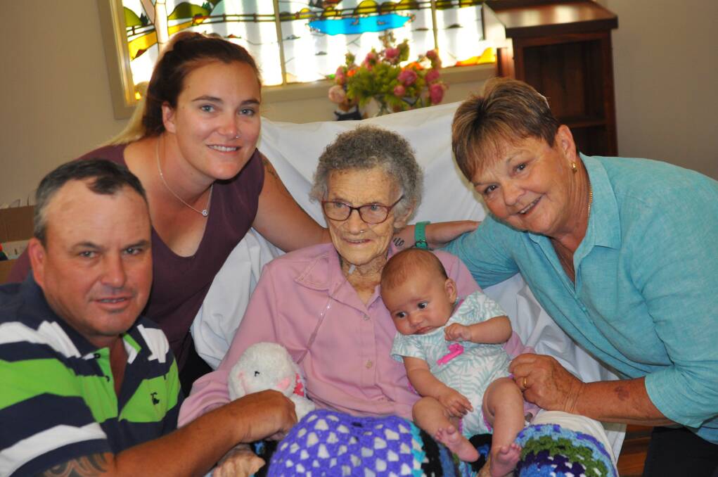 Marj Riley (Selway) holding her great-great-grand-daughter Flinn, pictured with her grandson Paul Wicks, great-grand-daughter Gemma Wicks and her daughter Trish Wicks. Photo: Marie Hobson