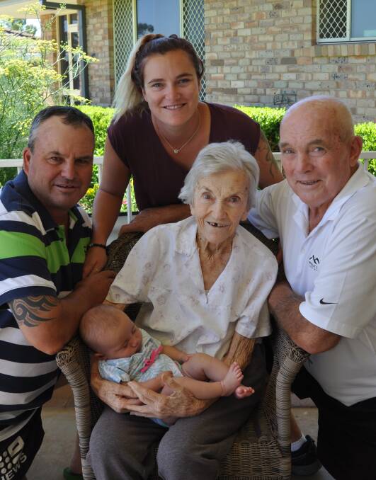 Joyce Wicks (centre) holding her great-great-grand-daughter Flinn, with grandson Paul great-grand-daughter Gemma and son Peter. Photo: Marie Hobson
