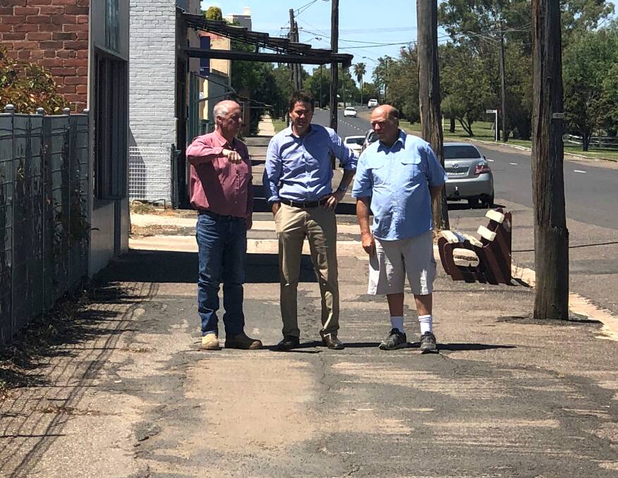 Liverpool Plains Shire Council Mayor Andrew Hope, Tamworth MP Kevin Anderson and deputy mayor Paul Moules on Single Street in Werris Creek on Tuesday.