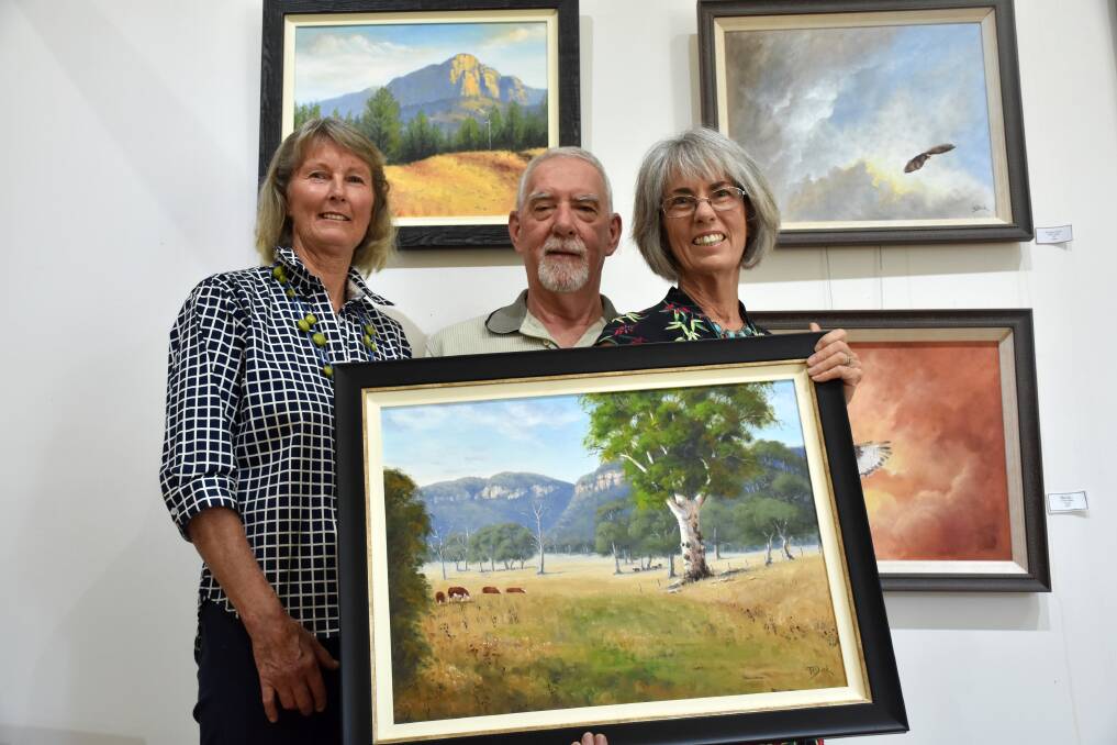 Robyn Marheine, Brian Duck and Robbie Duck are among the artists exhibiting works at the Paintbrushes and Pencils exhibition at the Gunnedah Bicentennial Creative Arts Gallery. Photo: Supplied
