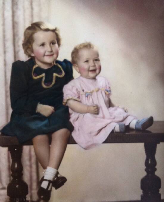 Marie with her sister Cathy in 1953.