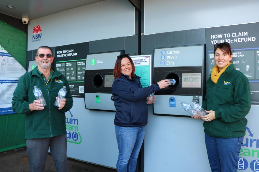 CanAssist's Ray Knight, Kristy Bain and Lisa Ross at the Gunnedah Return and Earn machine.
