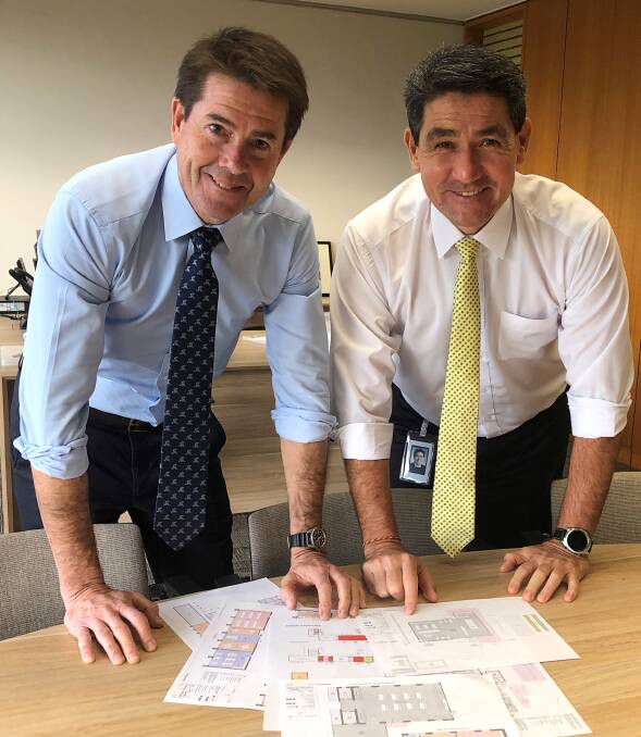 Tamworth MP Kevin Anderson and Minister for Skills and Tertiary Education Geoffrey Lee with plans for the Gunnedah TAFE upgrade. Photo: supplied