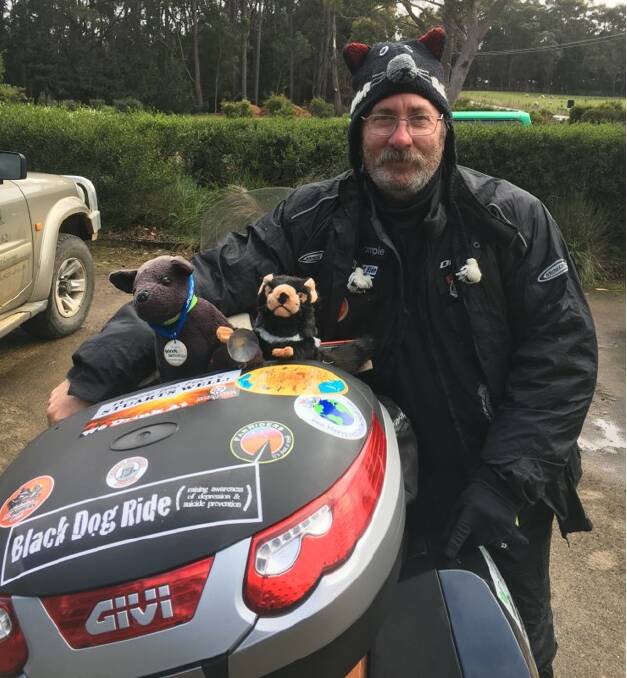 Black Dog Ride regional representative John Holyoake on a previous ride in Tasmania. Photo: Supplied