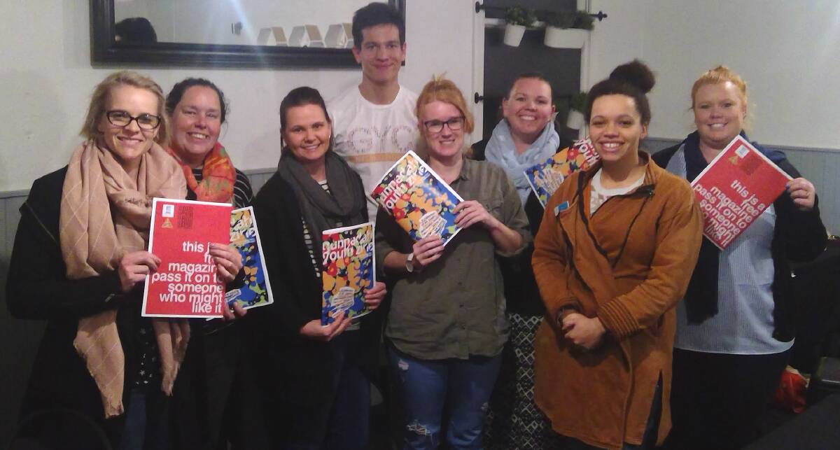 Gunnedah Youth Council's Aidan R de Luzuriaga (back, centre) gives copies of the Youth Zine to the Apex Club of Gunnedah. He is pictured with Emma Kersley, Donna Austin, Allyson Hoban, Erin McCabe, Aylish Flannery, Sewa Emojong and Heather Lidwinski.