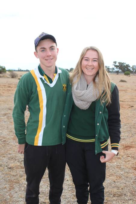 Ag students Adam McGuirk and Haylee Murrell at the plot.