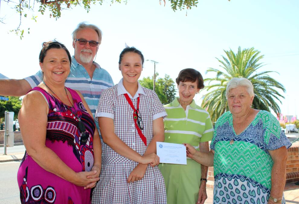 Calrossy student Lauren Jessup-Little (centre) has received an education grant through the Curlewis CWA. She is pictured with her mother Jo-Ann Little, stepfather Mick Curran and CWA members Hilary Budden and Denise Scott.