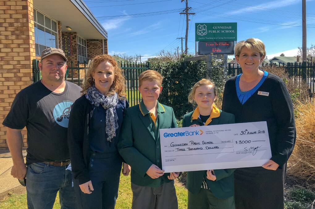 Gunnedah Public School will receive $3000 from the Greater Bank. From left P&C member Ray Williams, Greater Bank regional manager Jen Smith, schools captains Jack Lees and Serenity Taylor, and Gunnedah branch manager Jacqui Bull. Photo: Supplied