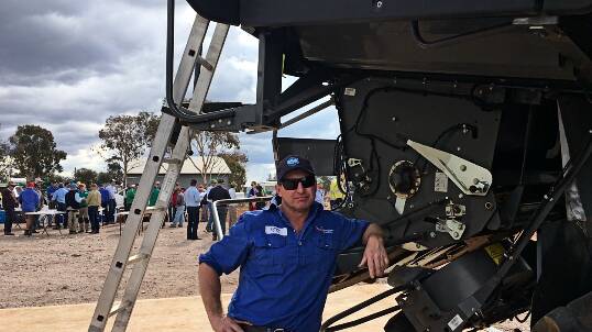 Quirindi agronomist Peter McKenzie with the modified harvester at the field day.