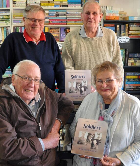 Ron McLean, front, left, has released a new book. He is pictured here with Second Edition Book Store's Meryl Hennessy, Gunnedah Newsagency's John Sturgess, back, left, and Gunnedah and District Historical Society's Bob Leister. Photo: Marie Hobson