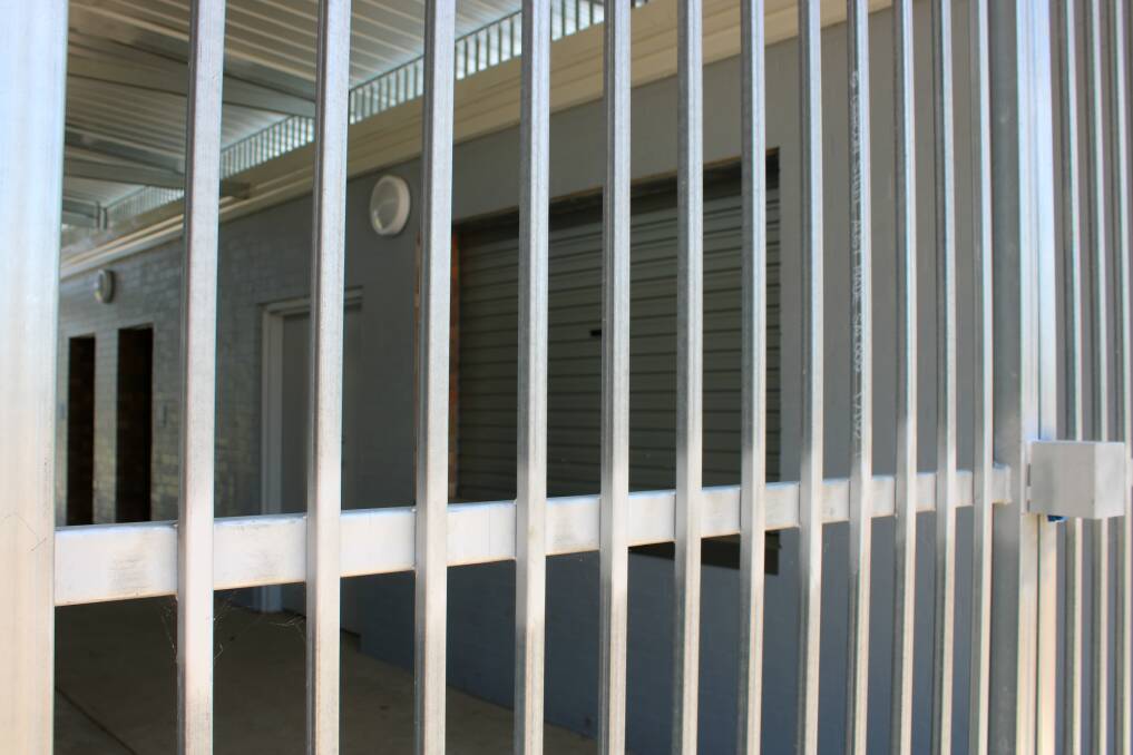 The canteen facility in the amenities block is protected by a security gate on either end of the breezeway.