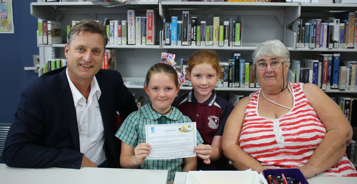 Gunnedah shire mayor Jamie Chaffey launching Bookends in April. He is pictured with Ava Mackley-Handsaker, Indianna Aldridge and Annette Marshall. 
