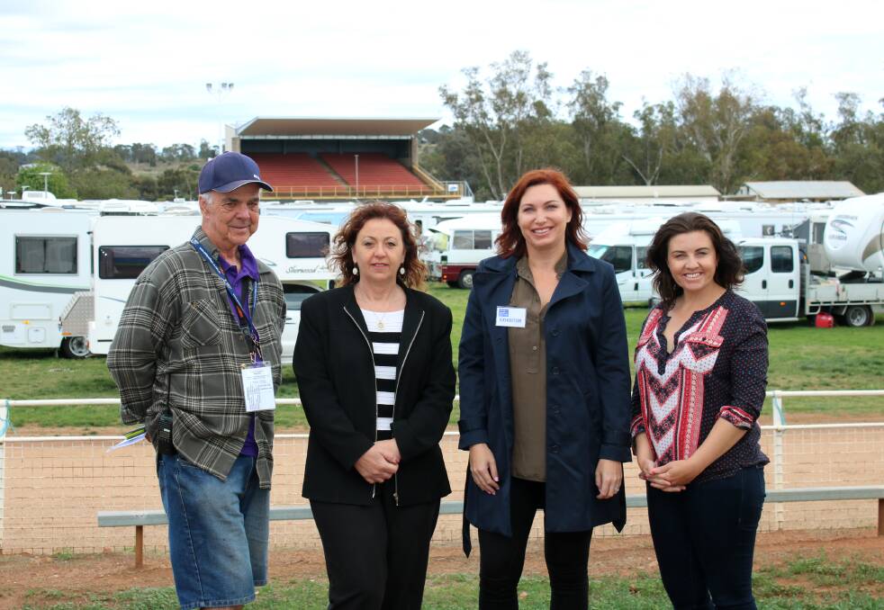 CMCA National Rally manager Paul Flynn with Gunnedah Chamber of Commerce's Treena Daniells, Stacey Cooke and Lisa Davis at the Gunnedah Showground today.