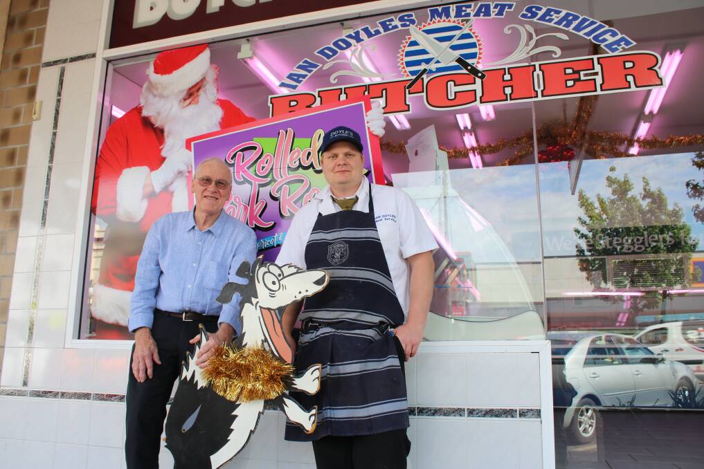Long-time butcher Ian Doyle at the shop with Brett Streater who started working with him at the age of 14. Ian passed the shop to Brett when he retired in October. 