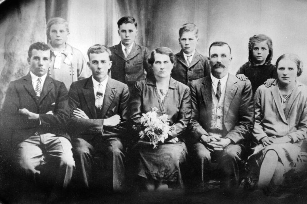 Tom (back, third from left) with his siblings Jack, Kate, Phil, Dave, mother Sophia, father Valentine and sisters Joyce and Irene.