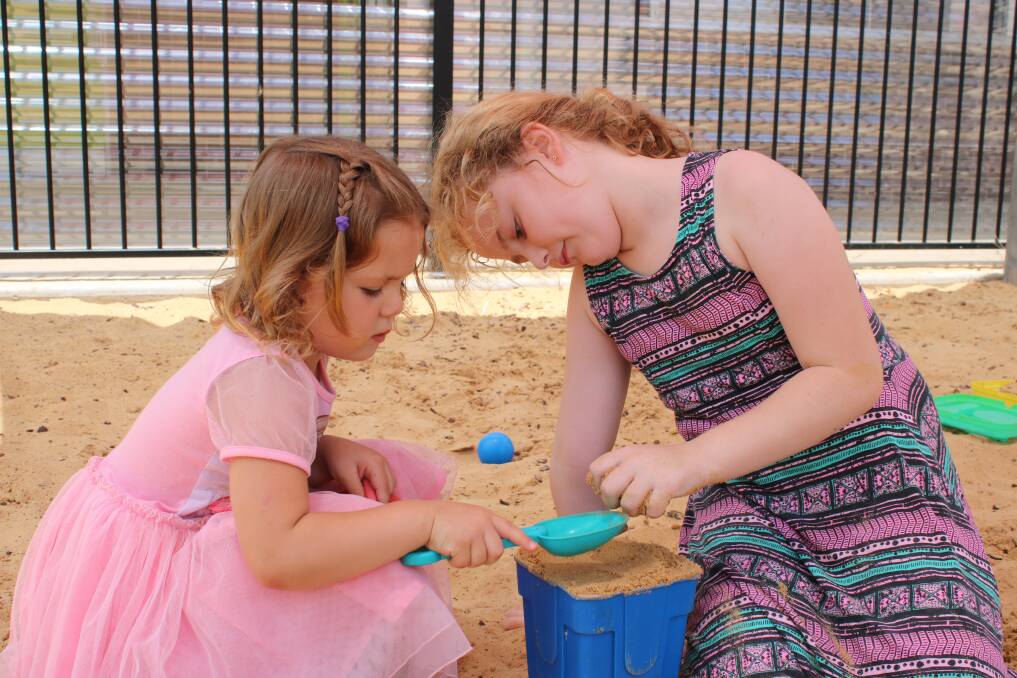 Five-year-old Willow-Roze Leveni and seven-year-old Shanelle Ryan are busy in the sandpit. Photo: Vanessa Höhnke