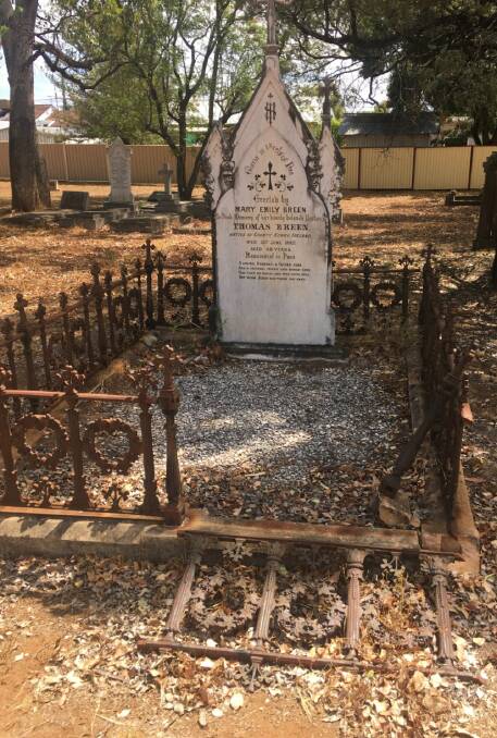 The gravestone before the restoration.