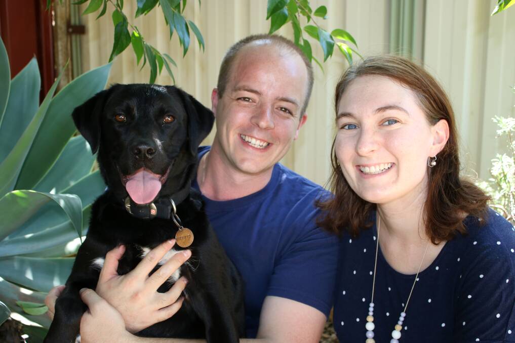 Aiden and Jess Sibrava with their labrador Pippa. The couple are moving to Kiama on January 13.