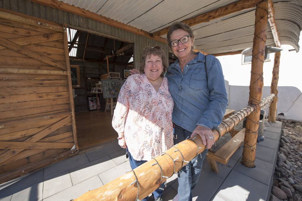 Artist Lorraine Maddigan (right) with Sue McKenzie at The Art Shed in Boggabri, which is one of the town's more recent attractions.