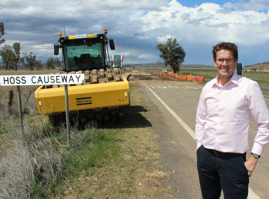 Tamworth MP Kevin Anderson at the site of the Hoss Causeway upgrade near Carroll. The completion date has been delayed by a year. Photo: supplied