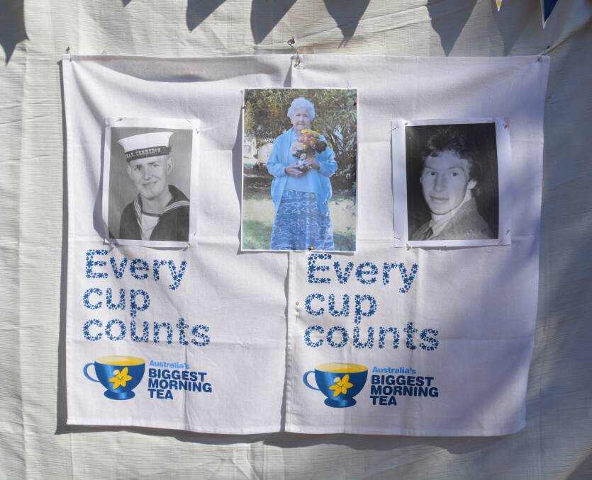 Annette Eveleigh displayed photos of her late mum, brother, and brother-in-law at the Curlewis Biggest Morning Tea.