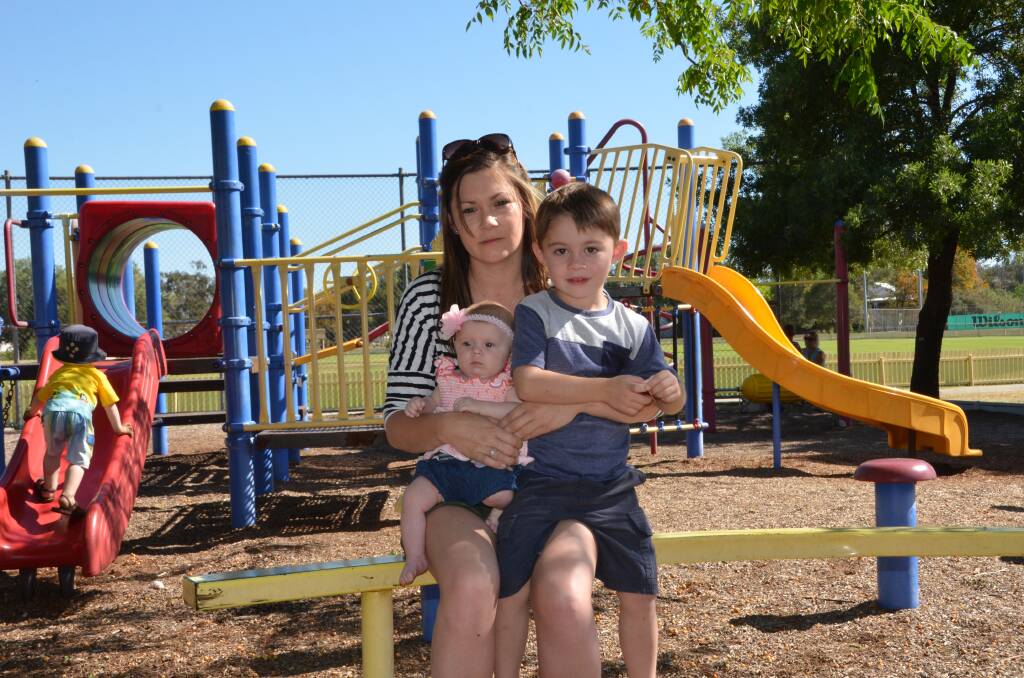 Ashley Bender with her son Kyren and daughter Azaylia at Wolseley Park in 2013. Kyren was diagnosed with autism at the age of two and his therapist recommended play therapy.